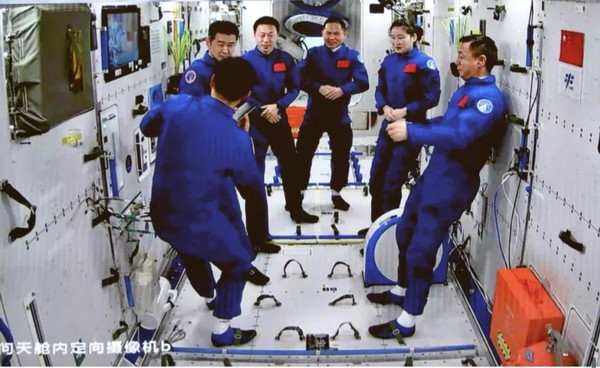 Shenzhou-15 and Shenzhou-14 crews pose for a group picture in China's space station Nov. 30, 2022. (Photo from the official website of China Manned Space)
