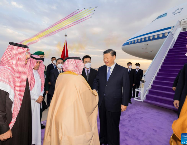 Chinese President Xi Jinping is warmly greeted upon his arrival by Governor of Riyadh Province Prince Faisal bin Bandar Al Saud, Foreign Minister Prince Faisal bin Farhan Al Saud, Minister Yasir Al-Rumayyan who works on China affairs and other key members of the royal family and senior officials of the government at the King Khalid International Airport in Riyadh, Saudi Arabia, Dec. 7, 2022.Chinese President Xi Jinping arrived here Wednesday afternoon to attend the first China-Arab States Summit and the China-Gulf Cooperation Council (GCC) Summit, and pay a state visit to Saudi Arabia at the invitation of King Salman bin Abdulaziz Al Saud of Saudi Arabia. (Xinhua/Huang Jingwen)