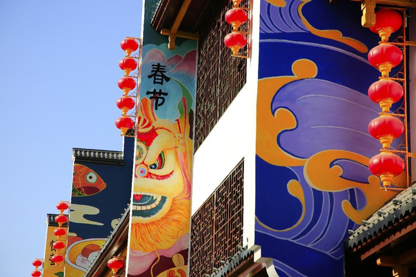 Wall paintings featuring the 24 solar terms on the Chinese lunar calendar are seen on a street with local characteristics in Jinfeng district, Yinchuan city, northwest China's Ningxia Hui autonomous region. The city attaches importance to exploring and inheriting history and culture while promoting city renewal. (Photo by Yuan Hongyan/People's Daily Online)