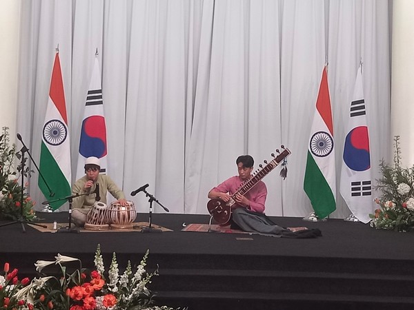 Musicians present traditional Indian music.