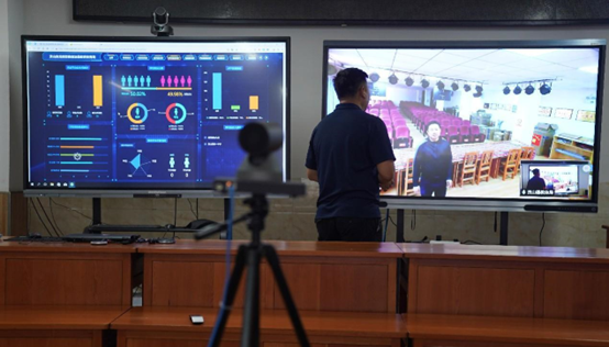 A staff member of the education and sports bureau of Gongshan Derung and Nu autonomous county, southwest China's Yunnan province, establishes an online classroom on a smart education platform with a local school, Sept. 6, 2022. (Photo by Liang Zhiqiang/People's Daily Online)