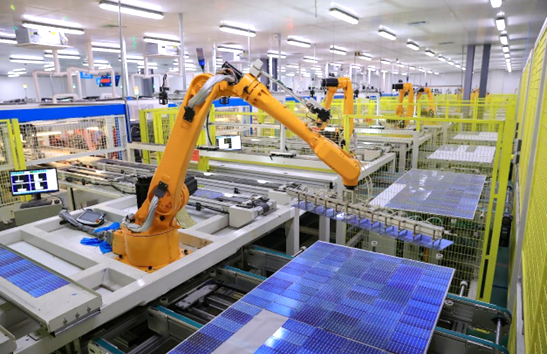 Solar panels are being produced by robotic arms in a workshop of Ronma, a photovoltaic product manufacturer in Dongying, east China's Shandong province, Jan. 6, 2023. (Photo by Zhou Guangxue/People's Daily Online)