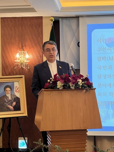 Ambassador Saeed Badamchi Shabestari of the Islamic Republic of Iran in Seoul speaks to the guests at a reception he hosted at the Lotte Hotel in Seoul on Feb. 9, 2023 in celebration of the National Day of Iran. Beside him is the framed picture of National Leader Imam Khomeini of Iran, founder of the country. The occasion was in celebration of the 44th anniversary of the Victory of the Islamic Revolution of Iran.