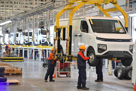 New energy vans are being assembled in a workshop in Jialing district, Nanchong, southwest China's Sichuan province, Feb. 9, 2023.