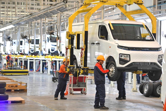 New energy mini vans are assembled in a workshop of a plant owned by Chinese carmaker Geely in Nanchong, southwest China's Sichuan province, Feb. 9, 2023. (Photo by Li Xiangyu/People's Daily Online)