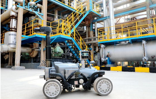 A smart robotic vehicle goes for an inspection tour in a plant of a chemical engineering corporation in Dongying, east China's Shandong province, Feb. 24, 2023. The vehicle is connected to a 5G local area network and equipped with various types of sensors that capture images, sounds, infrared pictures, as well as data of hazardous gases and temperature. It has effectively improved inspection quality and production safety. (Photo by Liu Zhifeng/People's Daily Online)