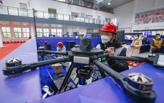 An artificial intelligence drone contest is held in the Huangshan division of the second National AI Application Technology Skills Competition, Jan. 3, 2023. (Photo by Shi Yalei/People's Daily Online) 