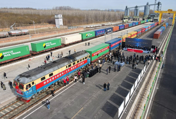 A freight train carrying construction materials and home appliances departs from Beijing for Moscow, Russia, March 16, 2023. (Photo by Sun Lijun/People's Daily Online)