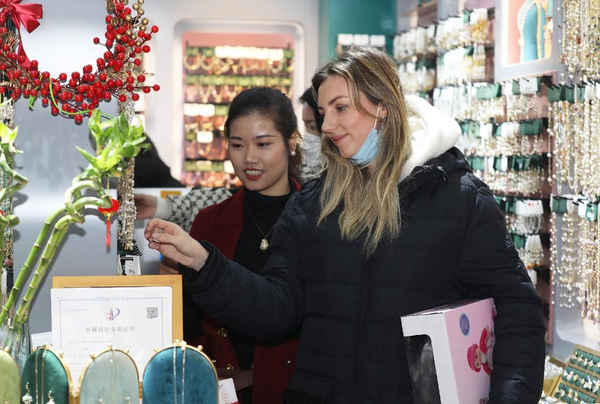 A Russian merchant buys products in Yiwu, east China's Zhejiang province, Feb. 2, 2023. (Photo by Gong Xianming/People's Daily Online)