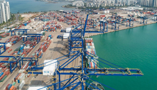 Photo taken on March 14, 2023 shows a busy scene at a container terminal of the Port of Haikou, south China's Hainan province. (Photo by Yang He/People's Daily Online)