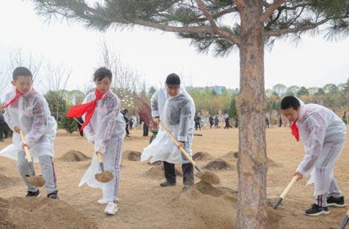 Chinese President Xi Jinping, also general secretary of the Communist Party of China Central Committee and chairman of the Central Military Commission, plants a tree during a voluntary tree planting activity in Beijing, capital of China, April 4, 2023. Xi and other leaders, including Li Qiang, Zhao Leji, Wang Huning, Cai Qi, Ding Xuexiang, Li Xi, and Han Zheng, planted trees with local people at a city park in the eastern district of Chaoyang in the spring shower. (Xinhua/Ju Peng)