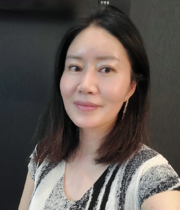 Korea Post Editorial Writer Ms. Esi Han