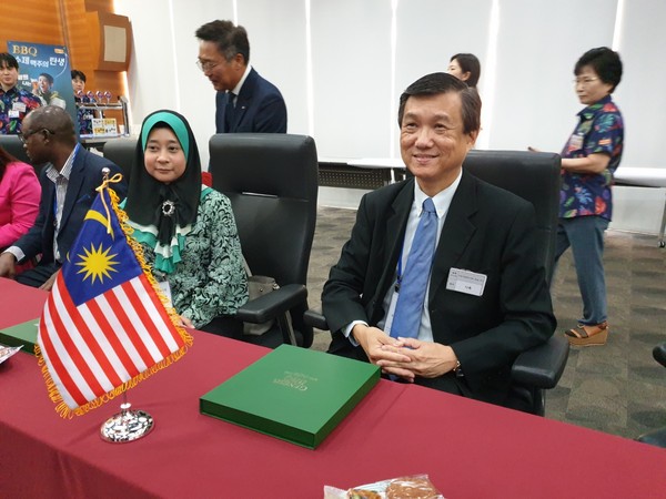 Ambassador Datuk Lim Juay Jin of Malaysia (right) foreground listens to the introduction made by the representative of BBQ Company.