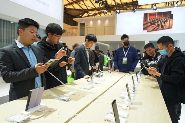 Smartphones are exhibited at the Appliance and Electronics World Expo 2023 in Shanghai, April 27, 2023. (Photo by Ma Weiqin/People's Daily Online)
