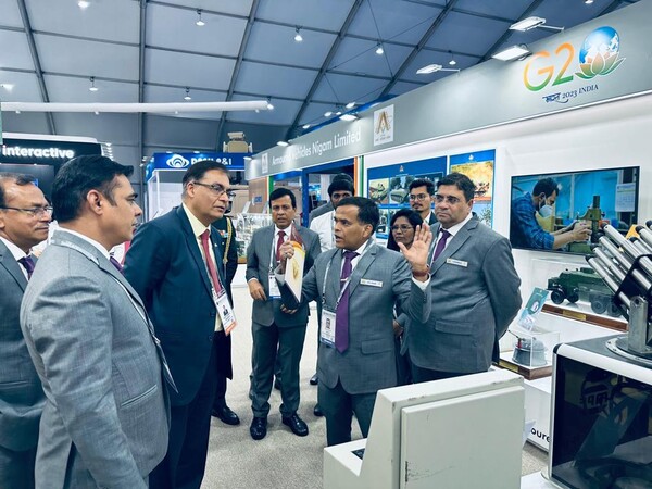 Ambassador Kumar (3rdh from left) listens to explanations given by an official of Armored Vehicles Nigam, an Indian state-owned defense company.