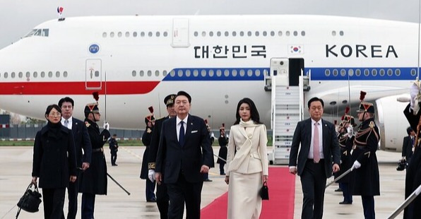 South Korean President Yoon Suk Yeol and first lady Kim Keon Hee arrive at Paris Orly Airport, near Paris, on Nov. 23, 2023.