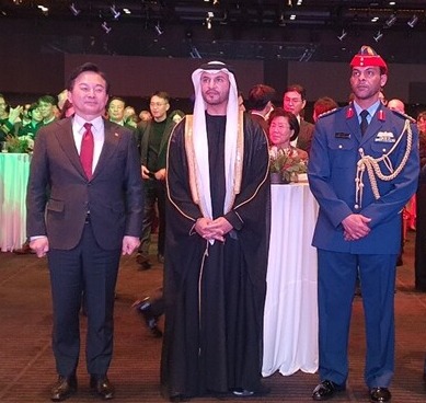 Ambassador Abdulla Saif Alnuaimi of the United Arab Emirates in Seoul (center, foreground) poses with Minister of Land, Infrastructure & Transportation Won Hee-ryong of the Republic of Korea (left) and Defense Attaché Hamad AL -Kindi (right)