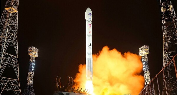 This photo, carried by North Korea's official Korean Central News Agency on Nov. 22, 2023, shows the North launching a military spy satellite, called the Malligyong-1, on a new type of Chollima-1 rocket the previous day. (For Use Only in the Republic of Korea. No Redistribution)