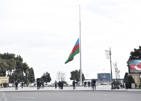 Azerbaijan national flag shows at on esrly age of sorrow