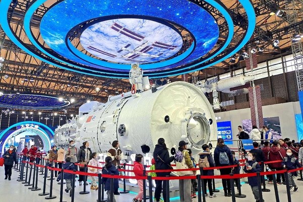 People visit an exhibition of achievements in China's manned spaceflight program at the Shanghai New International Expo Center, Shanghai, Jan. 18, 2024. (Photo by Yan Daming/People's Daily Online)