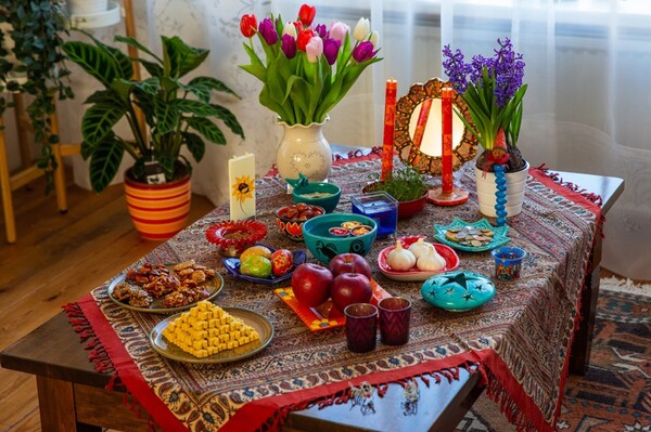 Nowruz is celebrated by Haft Sin: Households decorate a table with seven items that represent the new season which begin with the Persian letter sin (S)
