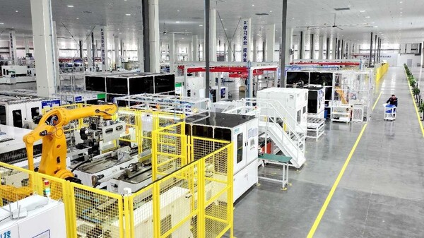 Cell packs for new energy vehicles are assembled in an intelligent workshop of a power battery enterprise in Hefei, east China's Anhui province. (Photo by Zhang Min/People's Daily Online)
