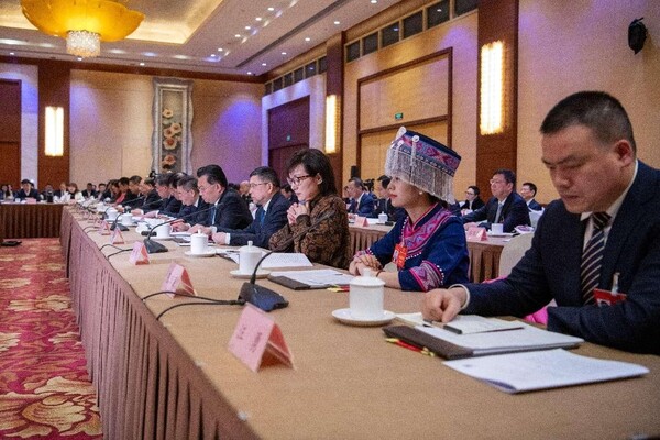 At a plenary meeting of the Hubei province delegation during the second session of the 14th National People's Congress, deputies review the Government Work Report, March 5, 2024. (Photo by Weng Qiyu/People's Daily Online)