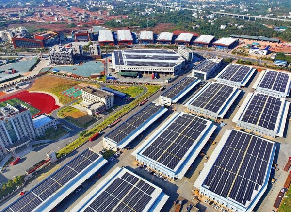 Photo shows photovoltaic panels installed on rooftops of warehouses in Ganzhou International Inland Port, east China's Jiangxi province. (Photo by Zhu Haipeng/People's Daily Online)