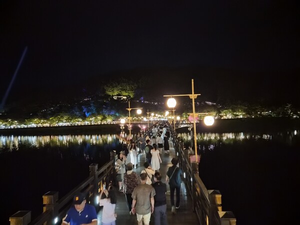 Wolyeong Night Walk illuminated by vibrant lights. (Source: Andong City, North Gyeongsang Province)